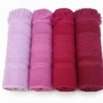 طقم فوط الفايد قطن 100% - 4 قطع - تدرج ألوان الأحمر والنبيتي والروز - علبة هدايا ملكية